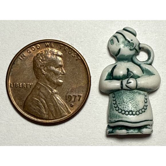 Vintage Cracker Jack Green and White Cartoon Character Woman Charm 1G - Picture 1 of 2